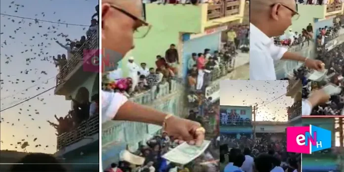 gujarat surpanch throws 500 rupees notes to public watch viral video