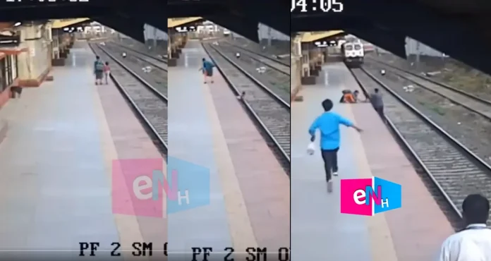 blind mother's child escaped by a man from railway rack video